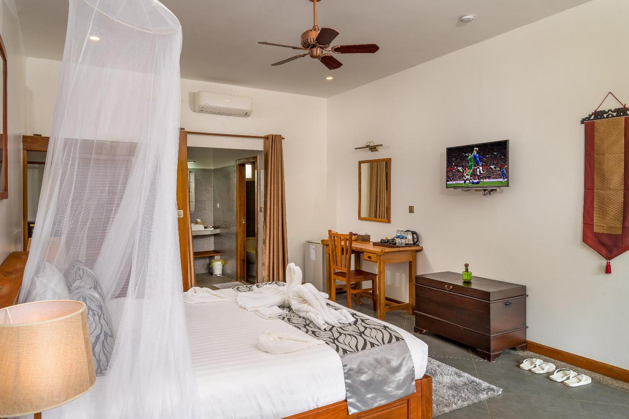 Savada Angkor Boutique Hotel Ciudad de Siem Riep Habitación foto
